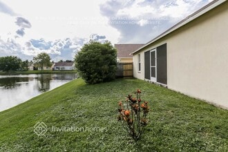 5040 Foxhall Dr N in West Palm Beach, FL - Foto de edificio - Building Photo