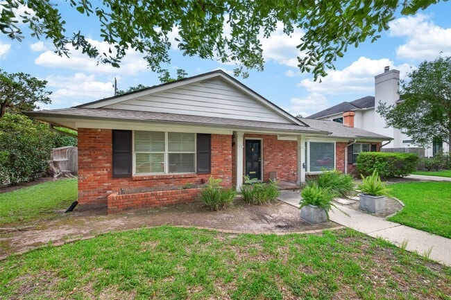 property at 5643 Piping Rock Ln