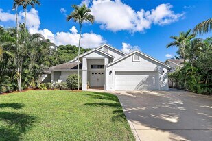 6051 Kendrick St in Jupiter, FL - Building Photo