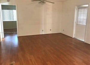 5860 Whispering Pine Way in Greenacres, FL - Building Photo - Building Photo