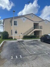1743 Village Blvd-Unit -107 in West Palm Beach, FL - Building Photo - Building Photo