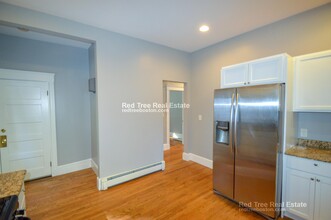 65 Mapleton St, Unit 1 in Boston, MA - Foto de edificio - Building Photo