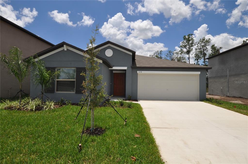 1458 Tahitian Sunrise Dr in Plant City, FL - Building Photo