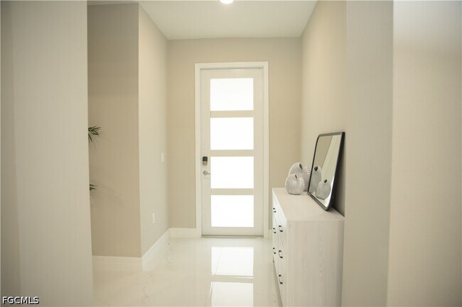 1228 Chrisholm St in Lehigh Acres, FL - Building Photo - Building Photo