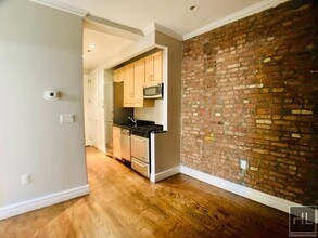 E 13TH ST., Unit 2B in New York, NY - Building Photo - Building Photo