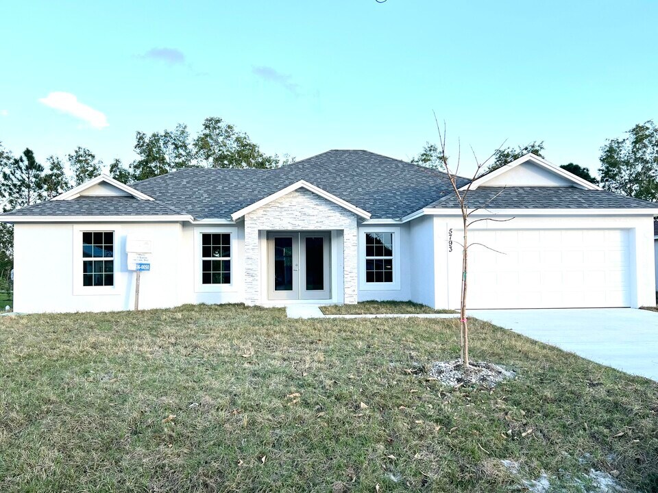 5797 NW Coosa Dr in Port St. Lucie, FL - Building Photo