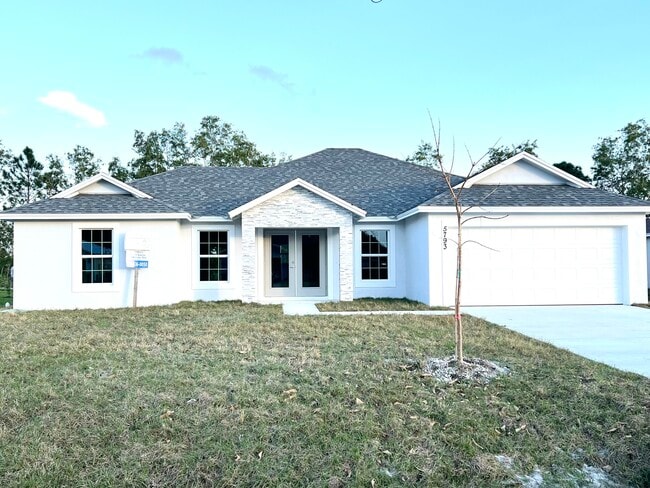 property at 5797 NW Coosa Dr