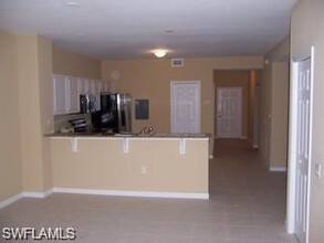 10037 Heather Ln-Unit -4-401 in Naples, FL - Foto de edificio - Building Photo