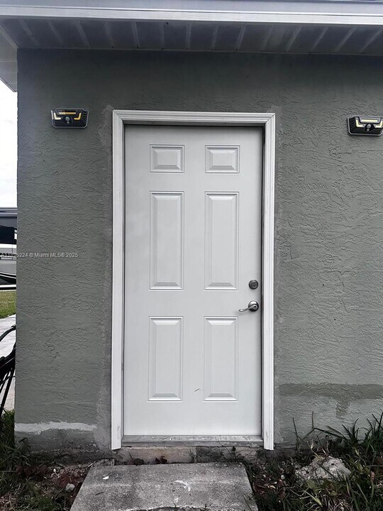 1442 SW Santiago Ave in Port St. Lucie, FL - Building Photo