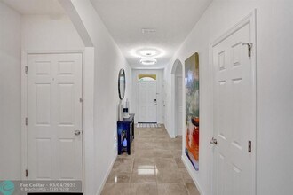6175 NW Regent St in Port St. Lucie, FL - Building Photo - Building Photo