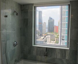 1050 Brickell Ave, Unit 3110 in Miami, FL - Building Photo - Building Photo