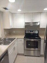 1503 SE Royal Green Cir, Unit V104 in Port St. Lucie, FL - Foto de edificio - Building Photo