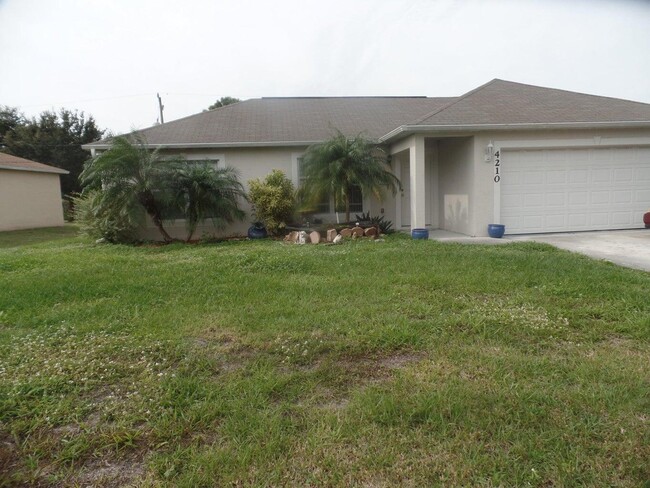 property at 4210 SW Utterback St