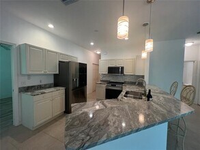 1585 Red Oak Ln in Port Charlotte, FL - Building Photo - Building Photo