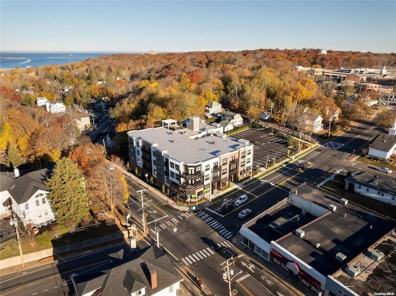 1 N Country Rd, Unit 102 in Port Jefferson, NY - Building Photo