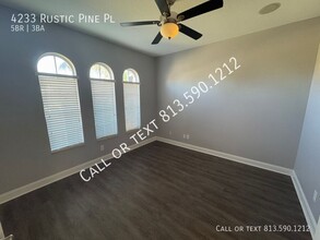 4233 Rustic Pine Pl in Wesley Chapel, FL - Building Photo - Building Photo