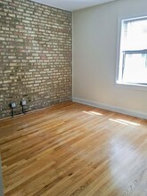 622 W Roscoe St, Unit 2C in Chicago, IL - Foto de edificio - Building Photo