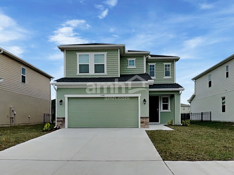 2543 Feather Crst Dr in St. Cloud, FL - Building Photo