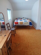 321 W Mcmillan Ave, Unit 1 in Newberry, MI - Foto de edificio - Building Photo