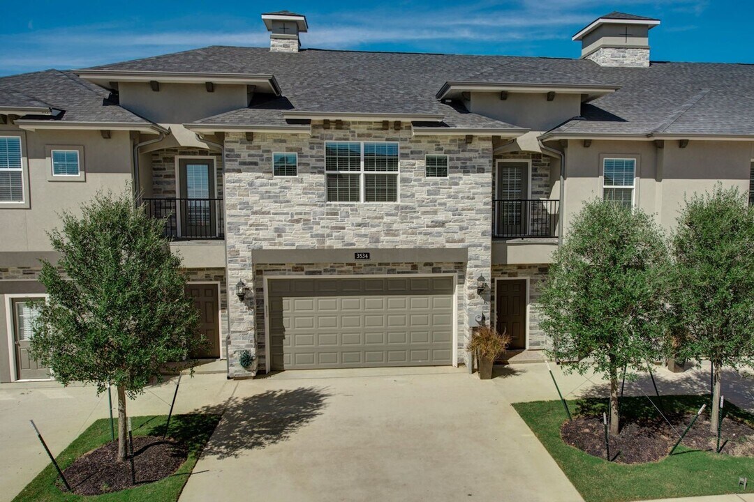 Available August 2026!! Luxury Townhome wi in College Station, TX - Building Photo