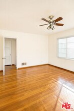 4062 S Muirfield Rd in Los Angeles, CA - Building Photo - Building Photo