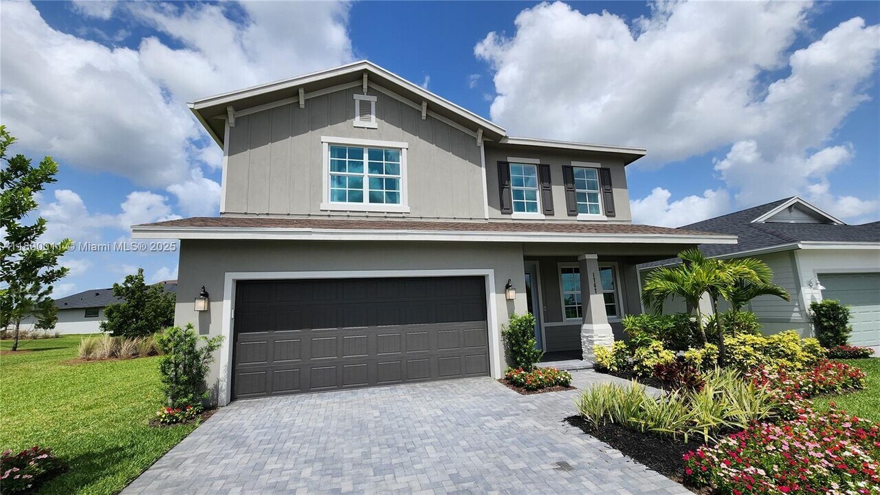 1767 Wandering Willow Wy in Loxahatchee, FL - Building Photo