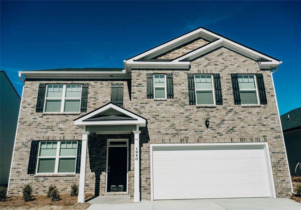1950 Vidalia Ct in Dacula, GA - Building Photo