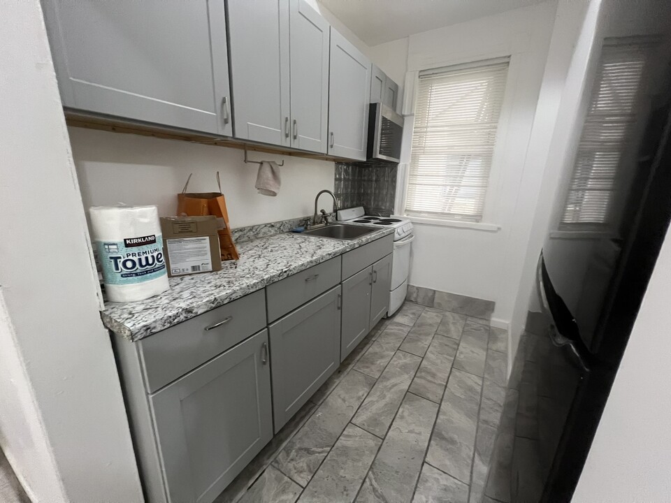 1409 McCulloh St, Unit A in Baltimore, MD - Building Photo