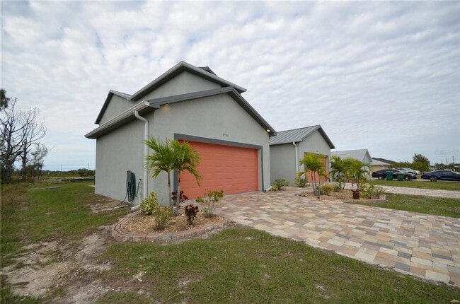 8581 Agate St, Unit 03-21 in Port Charlotte, FL - Building Photo - Building Photo