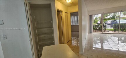 9001 Wiles Rd in Coral Springs, FL - Building Photo - Building Photo