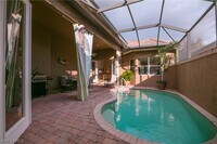 6088 Dogleg Dr in Naples, FL - Foto de edificio - Building Photo