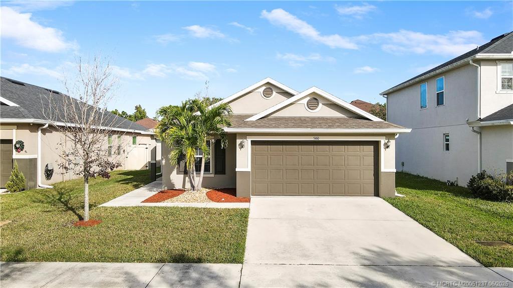 5160 NW Pine Trail Cir in Port St. Lucie, FL - Building Photo