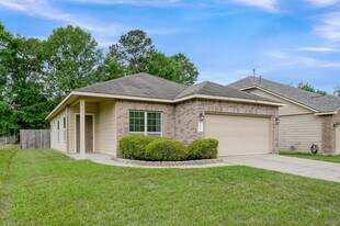 9594 E Woodmark in Conroe, TX - Building Photo