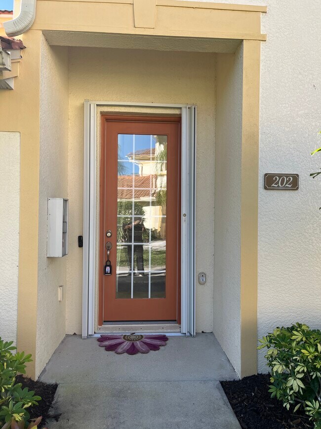 7877 Clemson St, Unit 202 in Naples, FL - Building Photo - Building Photo