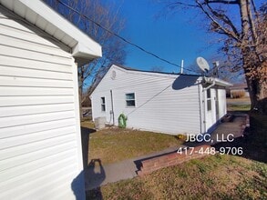 629 N Olive St in Nevada, MO - Building Photo - Building Photo