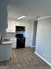 1220 Poplar St in Nashville, GA - Foto de edificio - Building Photo