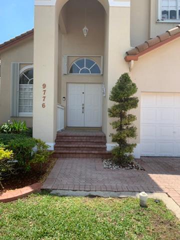 property at 9776 NW 30th St