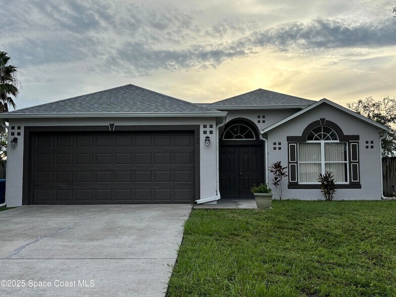 1064 Helena Ave NW in Palm Bay, FL - Building Photo