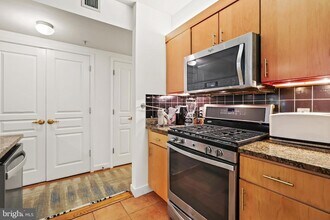 616 E St NW, Unit 1007 in Washington, DC - Building Photo - Building Photo