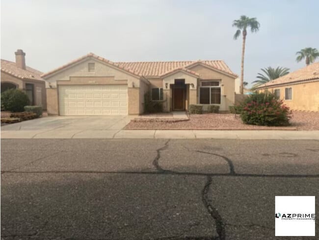 10322 W San Juan Ave