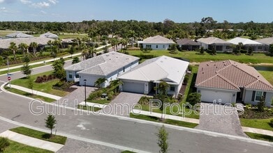 25569 Emerald Bnd Cir in Englewood, FL - Building Photo - Building Photo