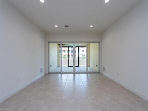 21450 Strada Nuova Circle-Unit -A204 in Estero, FL - Building Photo - Building Photo