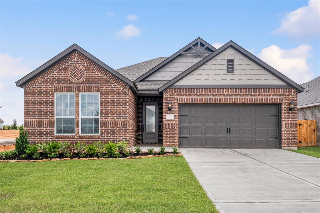 15671 Honey Cv Dr in Conroe, TX - Building Photo
