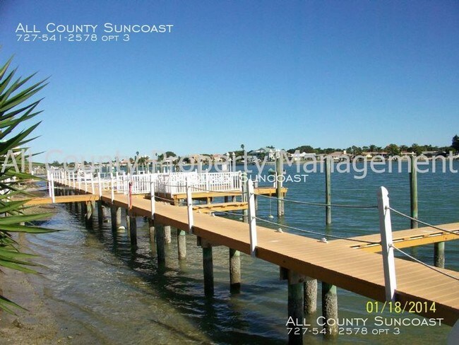 8911 Blind Pass Rd-Unit -111 in St Pete Beach, FL - Building Photo - Building Photo