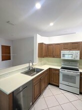 1074 Bluewood Ter in Weston, FL - Building Photo - Building Photo