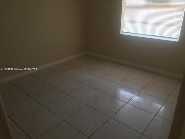 property at 4971 NW 13th St