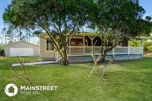 1219 Thompson Ave in Lehigh Acres, FL - Building Photo