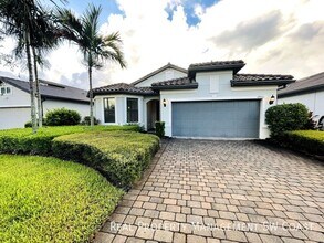 17021 Ashcomb Wy in Estero, FL - Building Photo - Building Photo