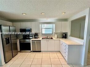 6081 SE Landing Way in Stuart, FL - Building Photo - Building Photo