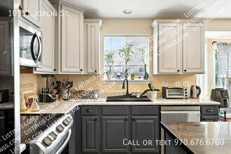 10151 Joplin St in Commerce City, CO - Foto de edificio - Building Photo